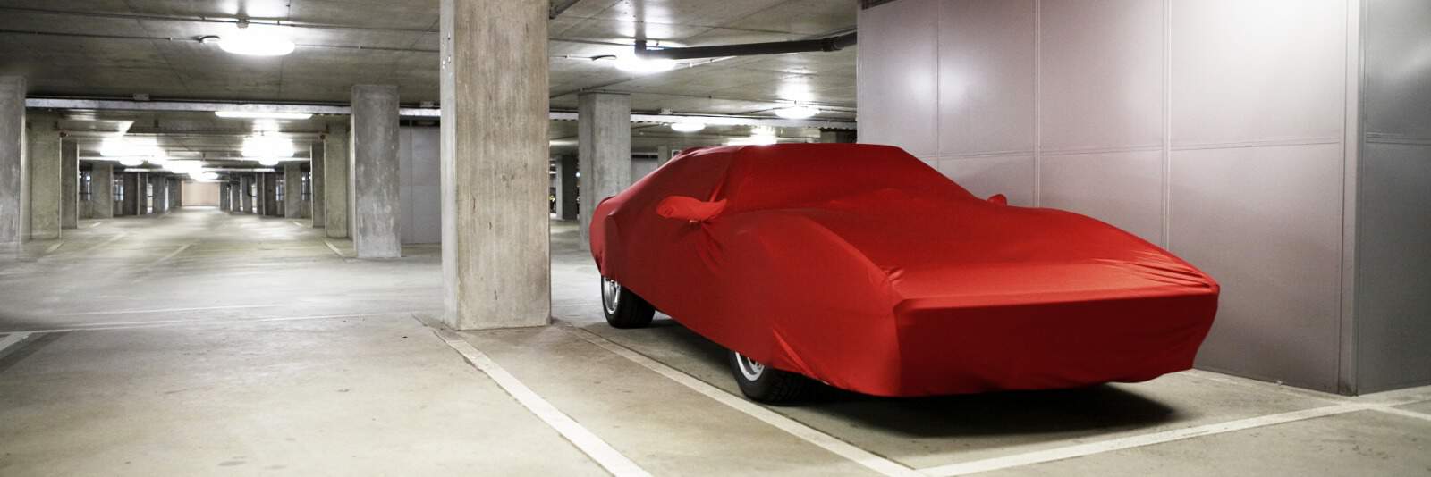 Sports Car in Storage under a Cover